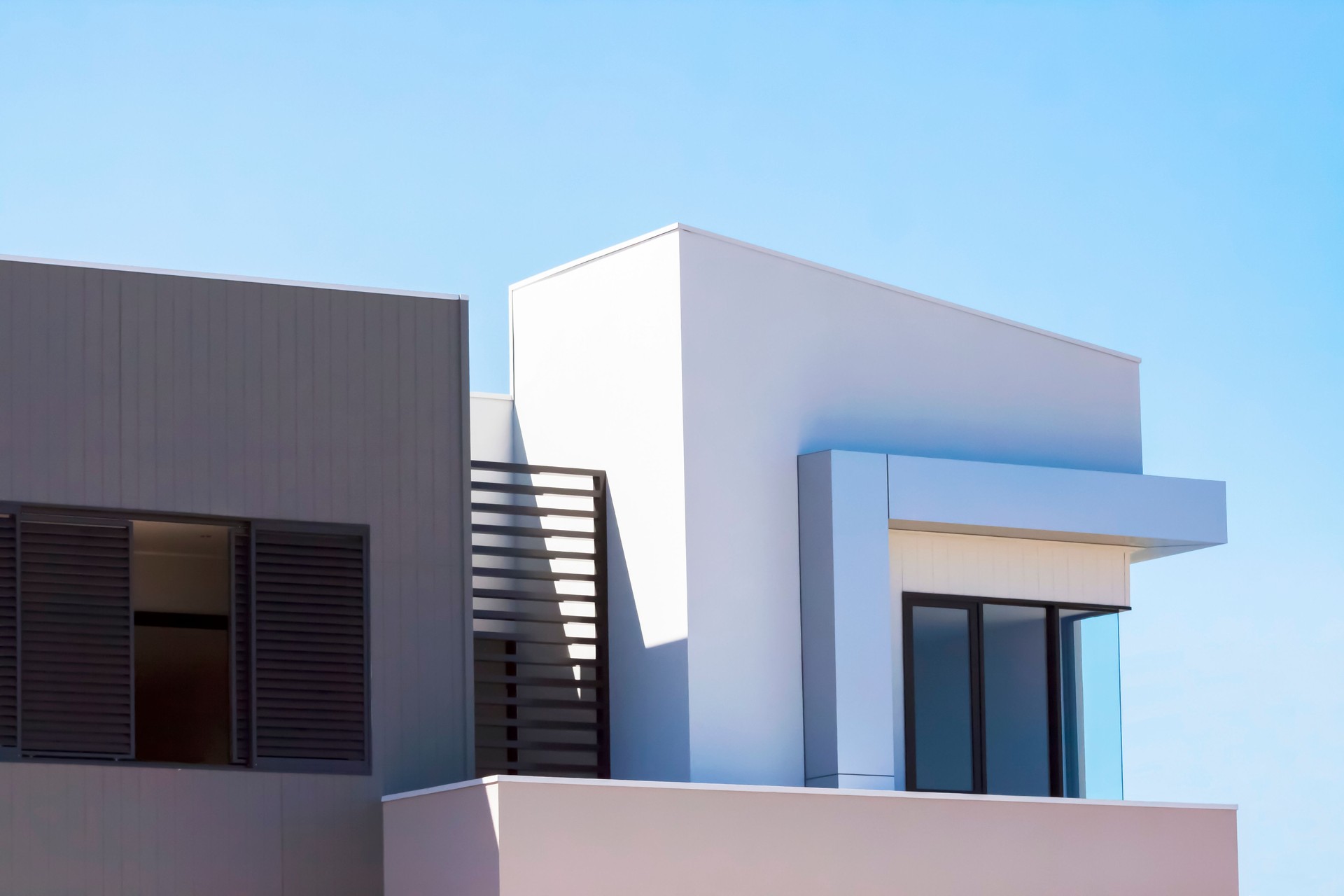 Closeup modern new house against blue sky, copy space